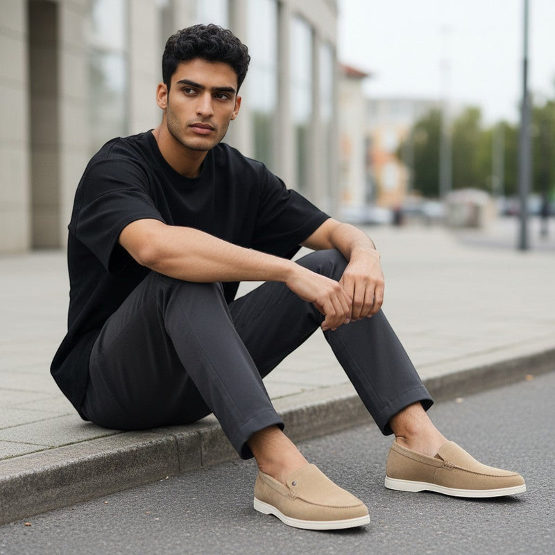 André AMIRAL SABLE tan suede loafers with contrast stitching and metal detail.