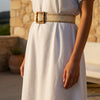 André Aurea beige woven paper belt with a square bamboo buckle and decorative stitching. Adjustable, hole-free design.