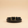André Luma black genuine leather belt with a gold oval buckle, perfect for jeans or dresses.