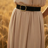 André black suede belt with oval gold buckle, made in Italy. Minimalist chic accessory for any outfit.