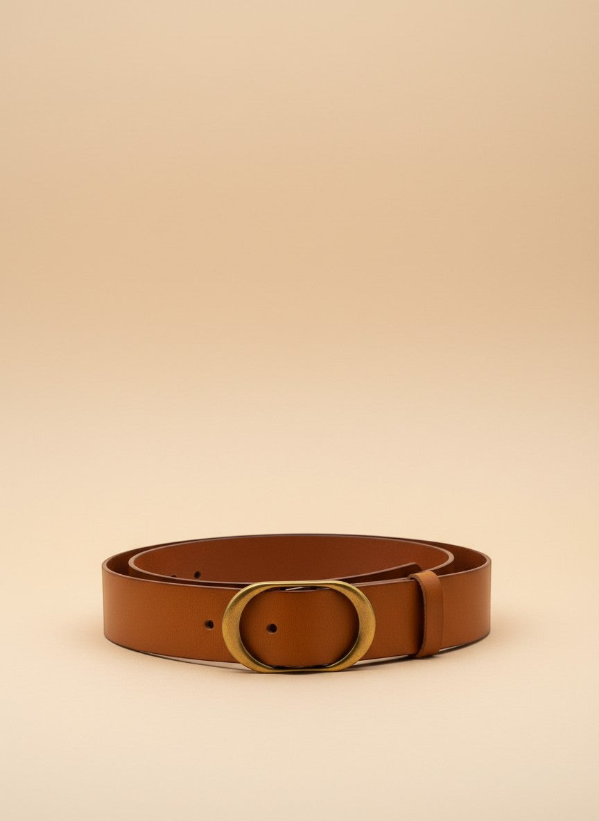 André Minerae camel leather belt with oval gold buckle, perfect for everyday chic.