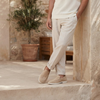 André Clement beige suede loafers for men with white soles. Casual yet elegant.