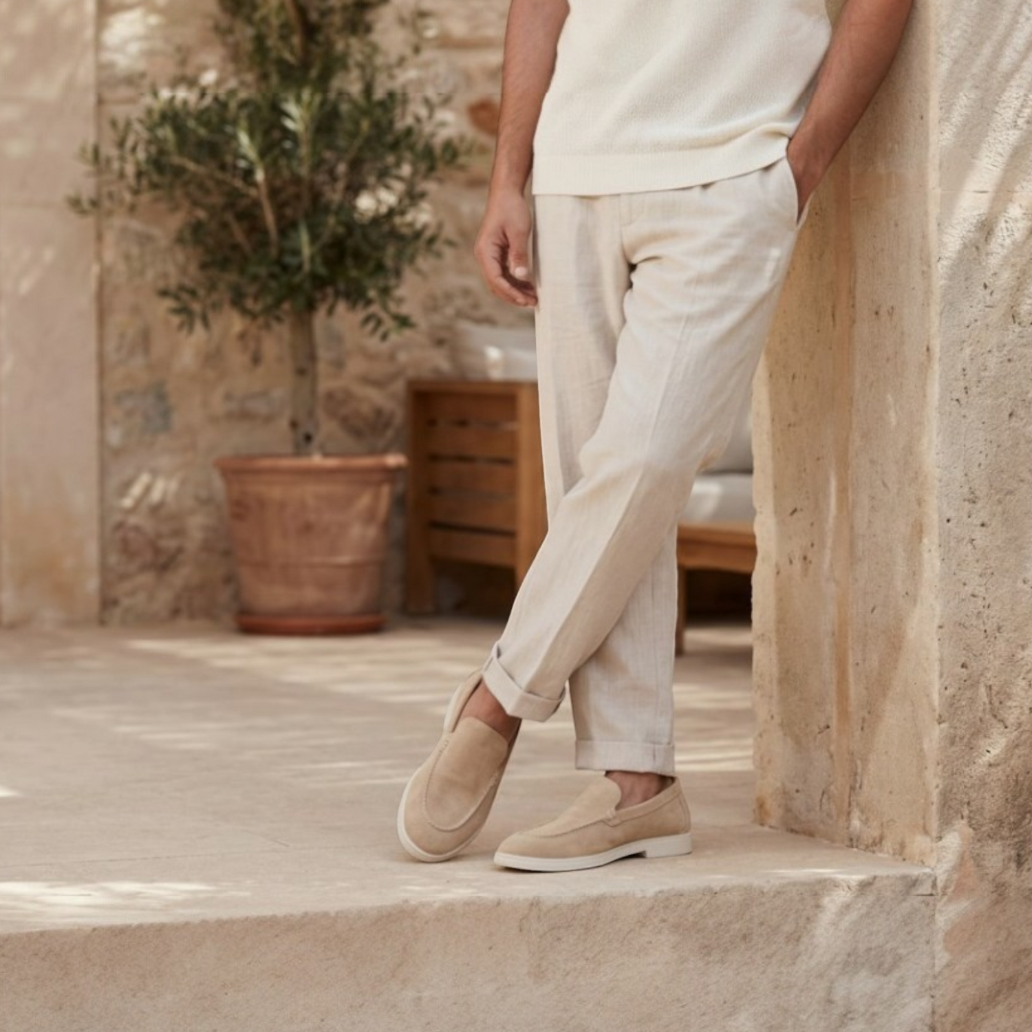 André Clement beige suede loafers for men with white soles. Casual yet elegant.