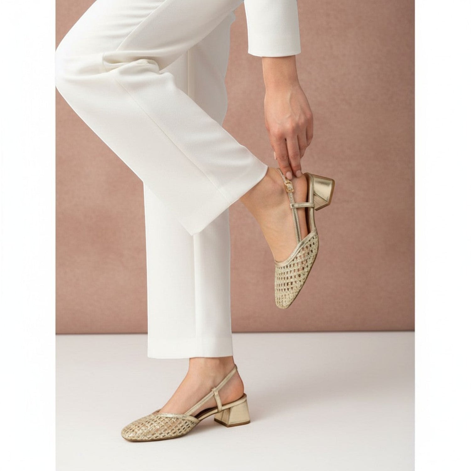 André OTILIA OR gold woven slingback sandals with a block heel and adjustable ankle strap.