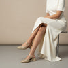 André OTILIA OR gold woven slingback sandals with a block heel and adjustable ankle strap.