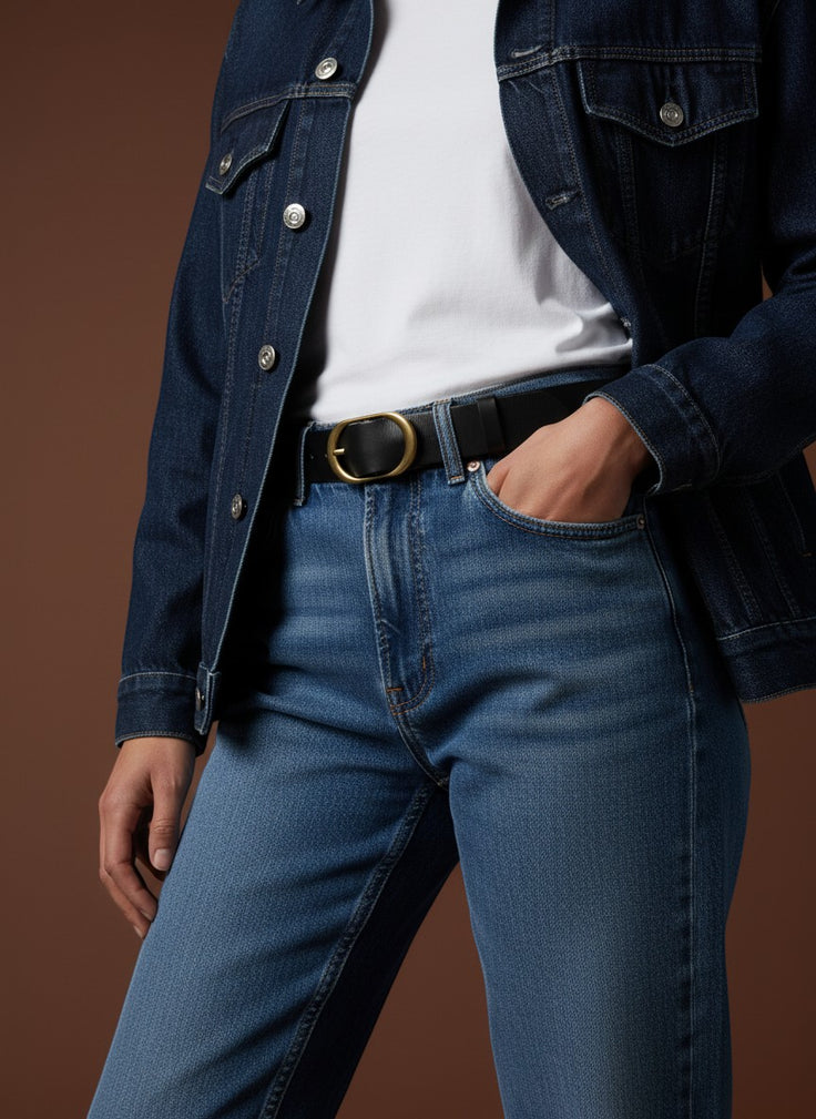 André Minerae black leather belt with oval gold buckle. Structured design, ideal for cinching waists on blazers or dresses.