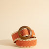 André orange woven paper belt with wooden buckle and contrasting trim, perfect for summer outfits.