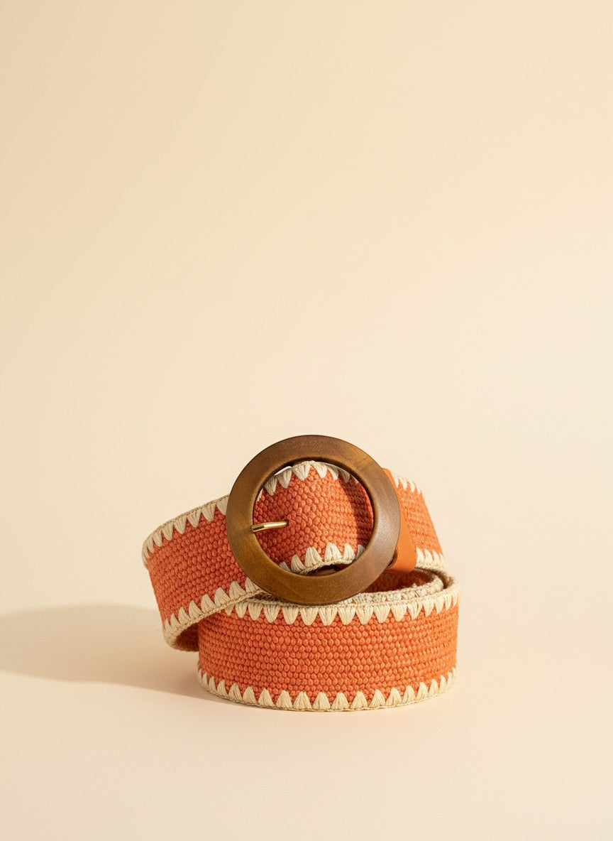 André orange woven paper belt with wooden buckle and contrasting trim, perfect for summer outfits.