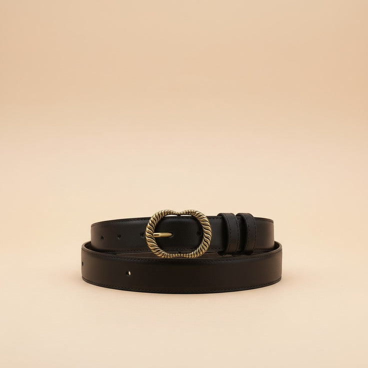 André Zestia cafe leather belt with ornate gold buckle. Deep brown, ideal for adding warmth to outfits.