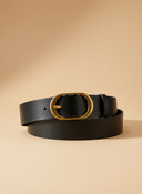 André Minerae black leather belt with gold oval buckle. Structured design, ideal for blazers and dresses.