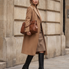 Botte NORAH noir portée avec sac, silhouette en pied